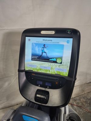 A treadmill with a screen that says welcome on it.