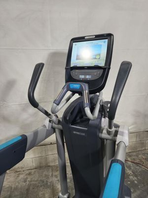 A close up of an elliptical machine with a monitor on it.