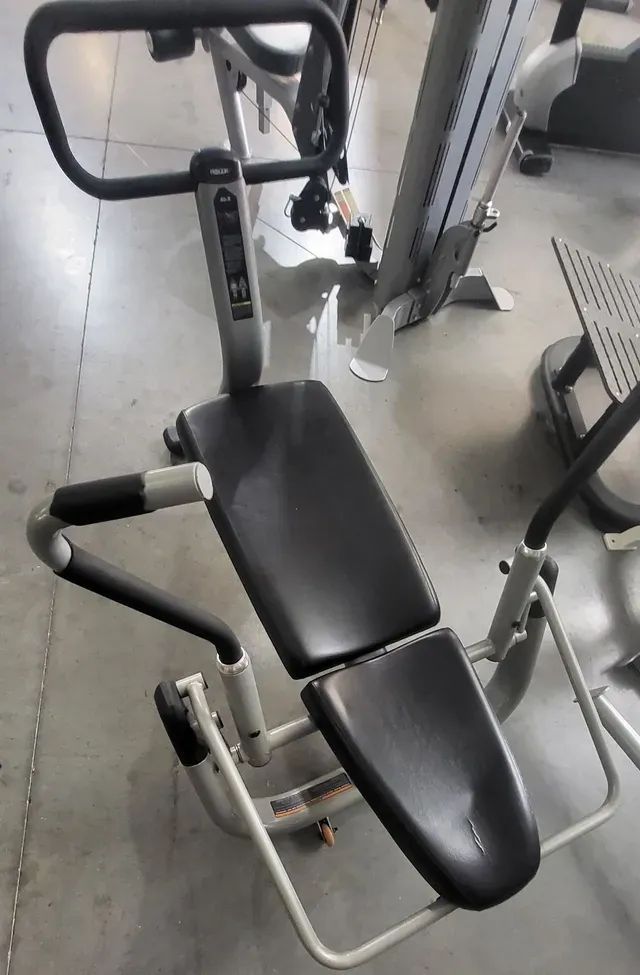 A black and white exercise machine in a gym