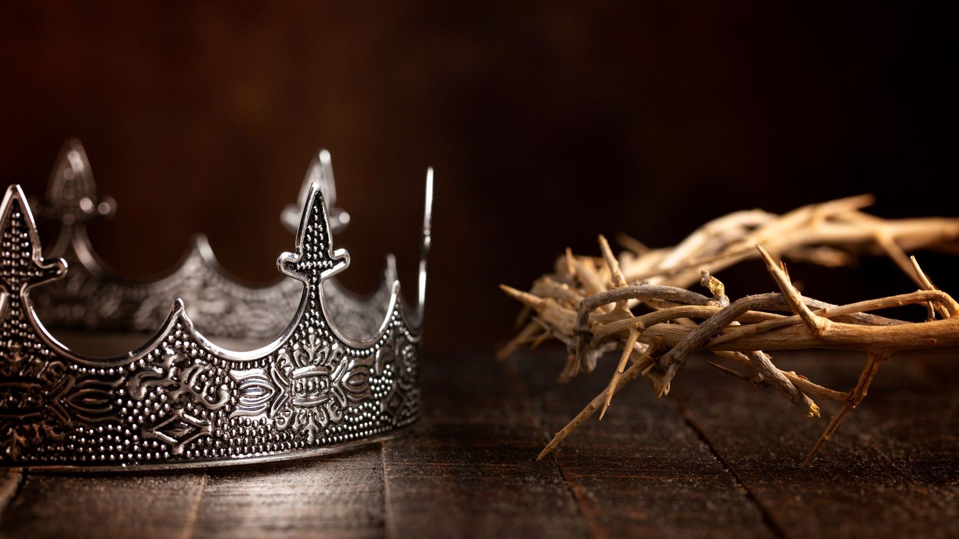 Two crowns, one made of metal and the other of thorns
