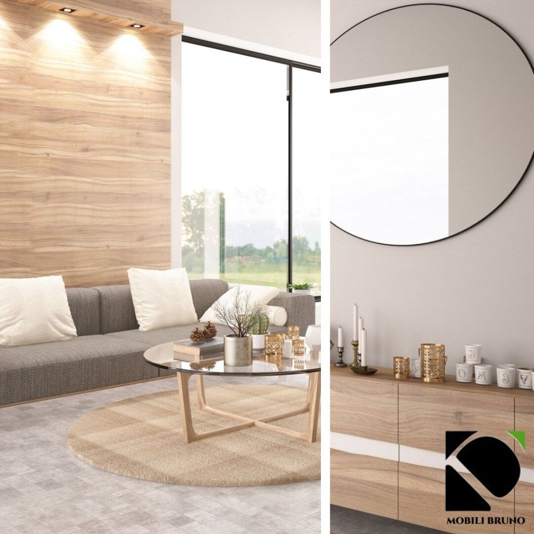 Soggiorno moderno con divano, tavolino e grande specchio.