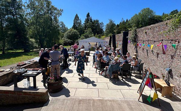 People enjoying River Garden cafe terrace