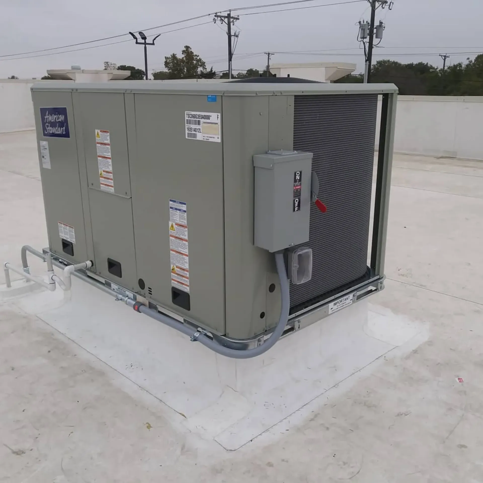 Panther City Electric LLC - A large gray box with a sticker on it that says ' air conditioning '