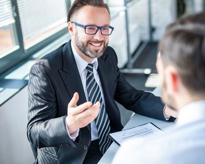 Client Talking To Consultant — Broomfield, CO — Mark Steichen CPA