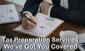 Person Writing On Report Papers — Broomfield, CO — Mark Steichen CPA Person Writing On Report Papers — Broomfield, CO — Mark Steichen CPA