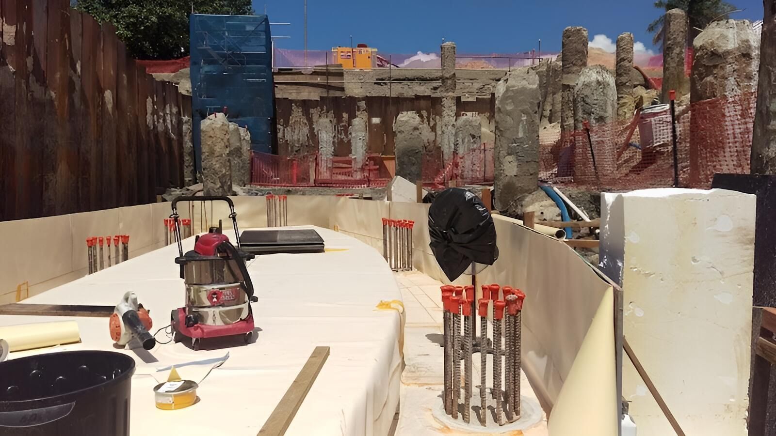 A Vacuum Cleaner Is Sitting On A Table In A Construction Site — Eldred Waterproofing In Cairns, QLD
