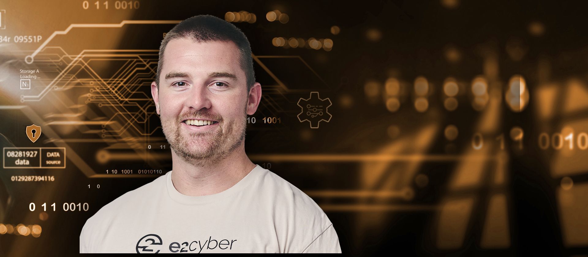 Man smiling in front of a digital circuit background.