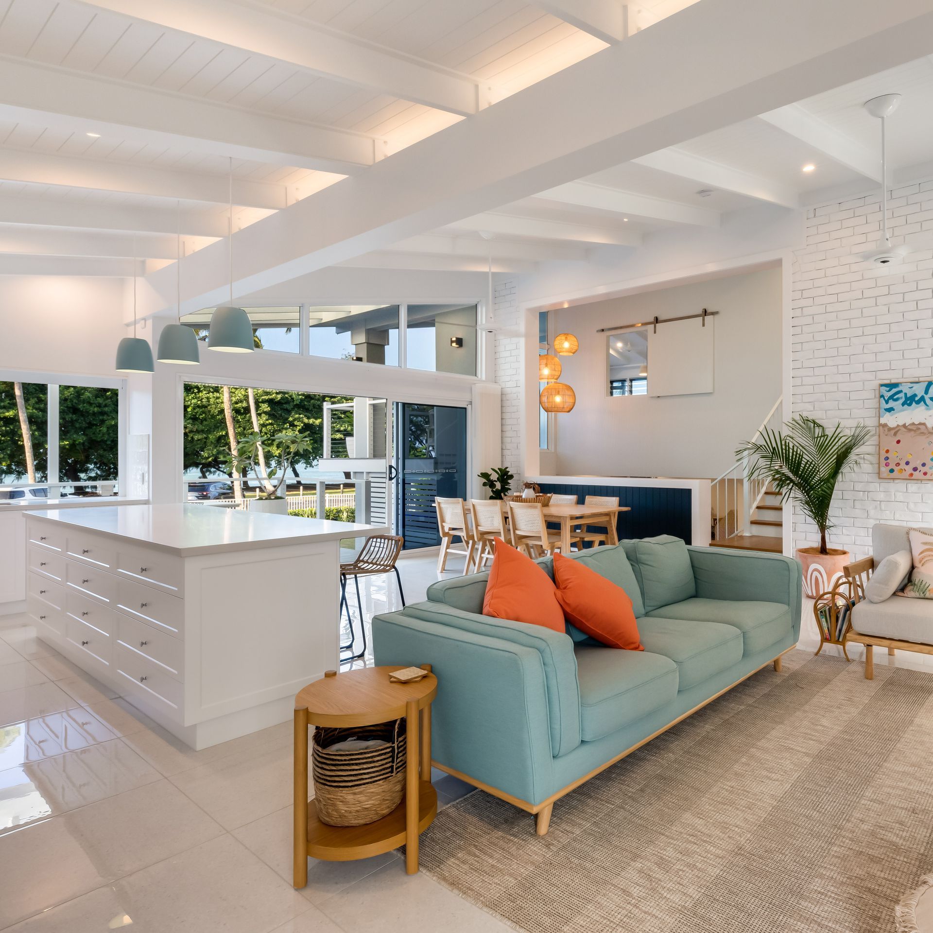 A Large House With A Swimming Pool In Front Of It — BOLD Architecture + Interior Design In Mackay, QLD