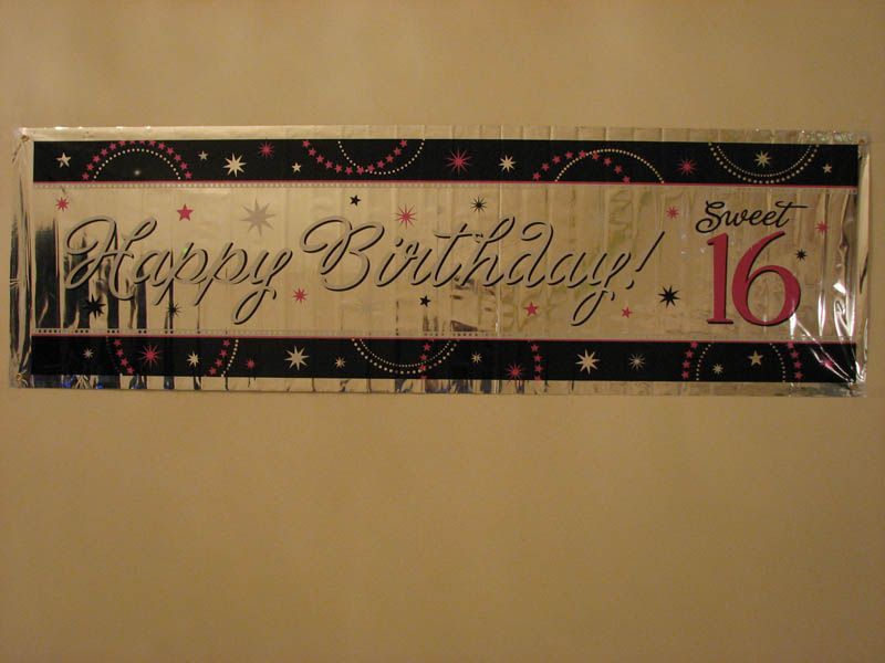 Happy Birthday Sweet 16 banner. Black and silver design with pink accents and stars.