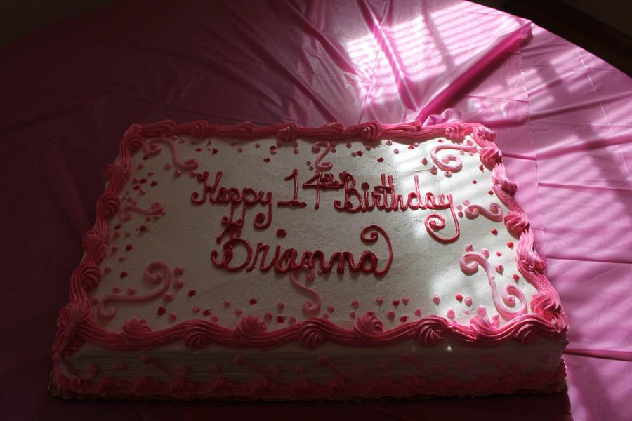 Pink frosted cake with 