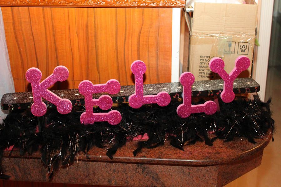 Pink glitter foam letters spelling 