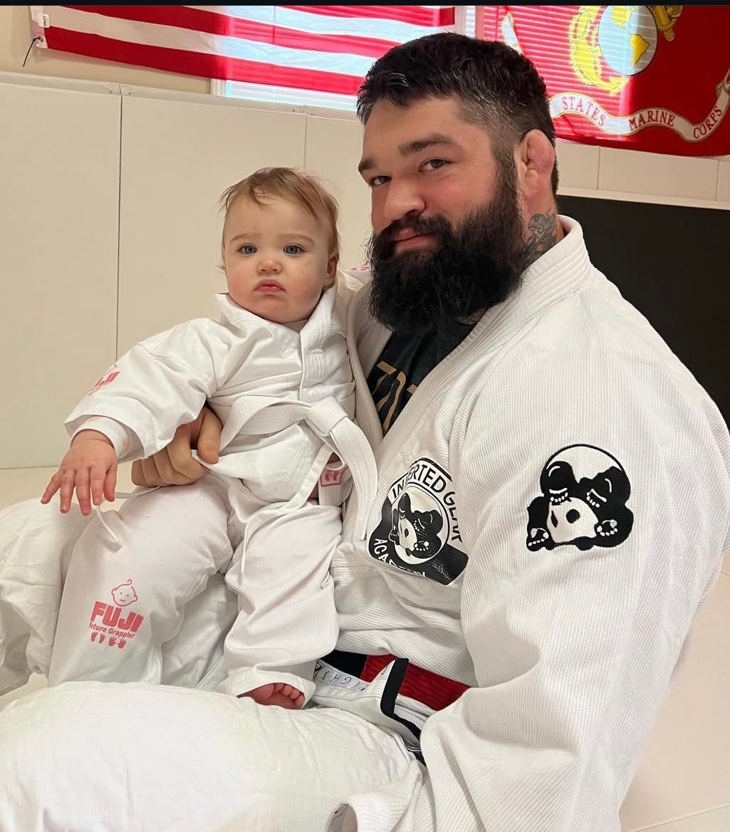 Adults training Brazilian Jiu-Jitsu at B-52 Jiu-Jitsu Academy in Perry, building calm, and fitness.