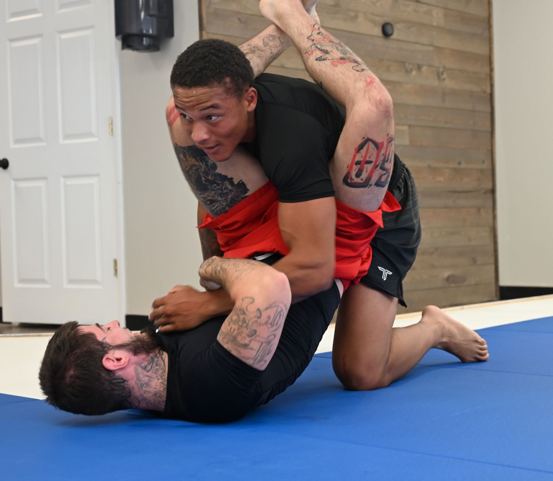 Adults drilling No Gi grappling at B-52 Jiu-Jitsu Academy in Perry, GA, building calm strength.
