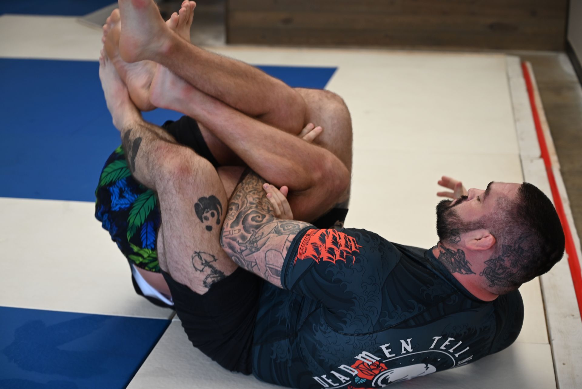 Adults practicing Brazilian Jiu-Jitsu drills at B-52 Jiu-Jitsu Academy in Perry, GA.