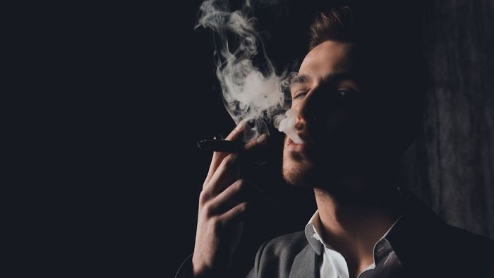 A man smoking cigar