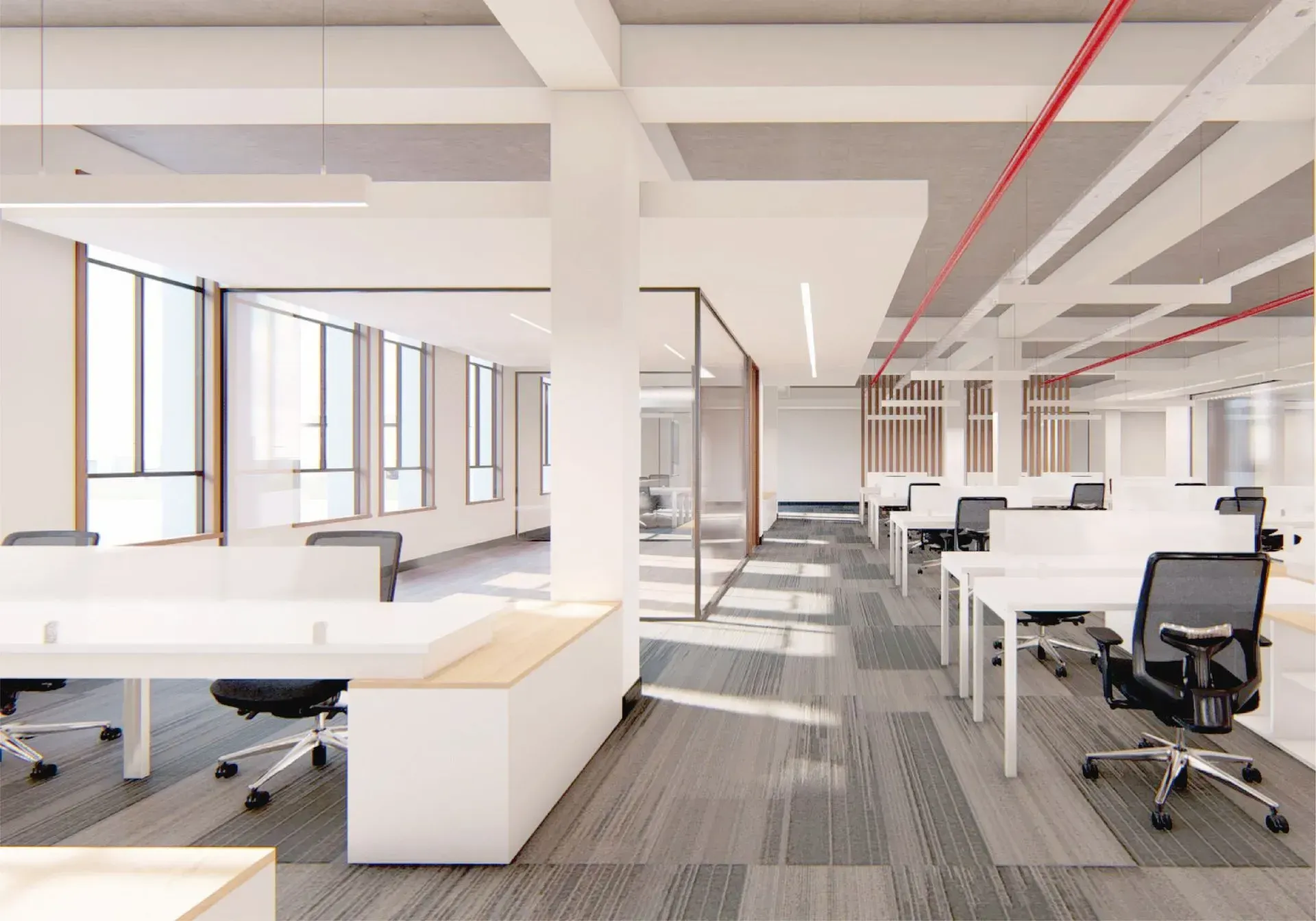 Espacio de oficina moderno con escritorios blancos, sillas negras y ventanas grandes; colores neutros.