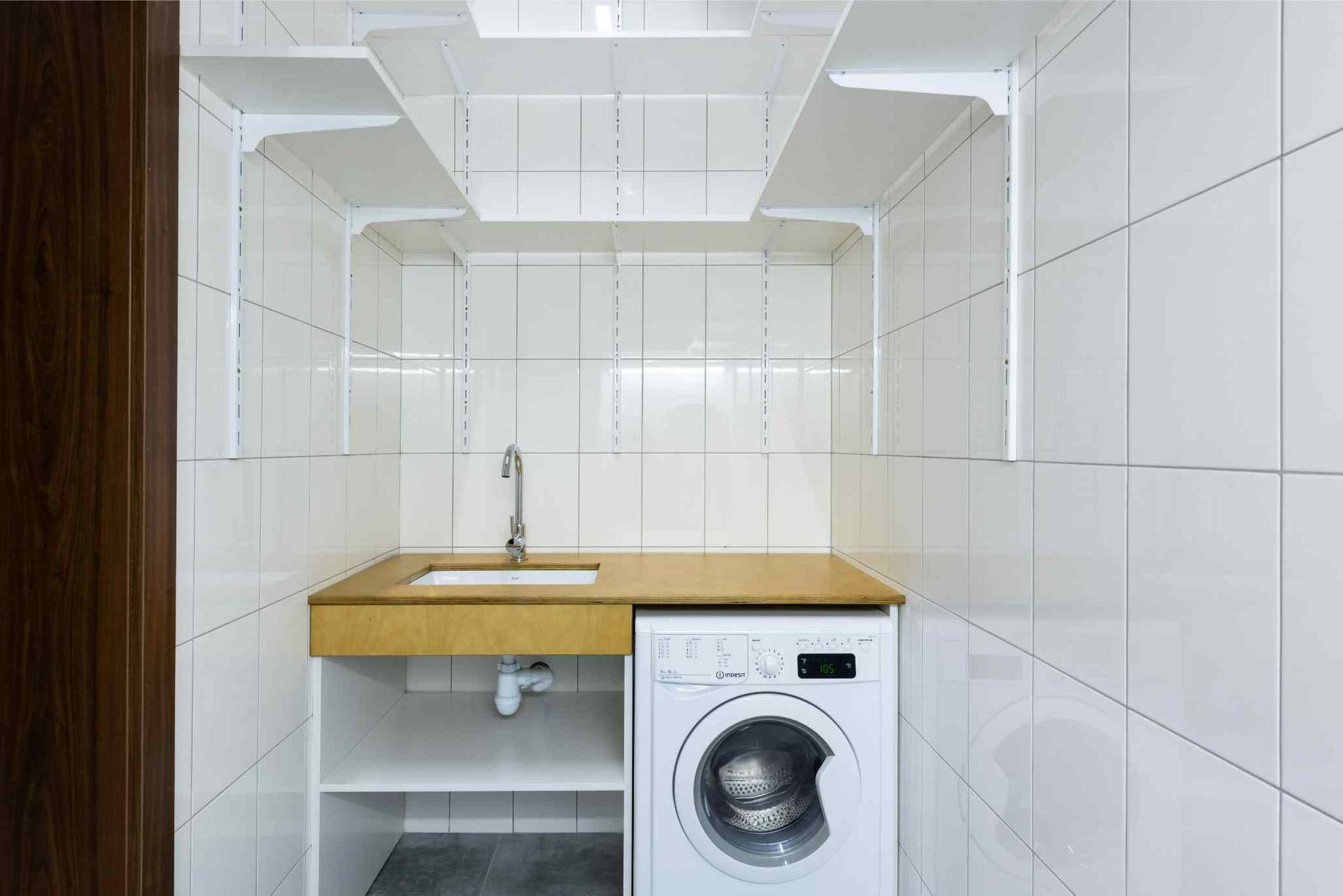 Newly deep-cleaned laundry room of a residential property in Bunbury WA.