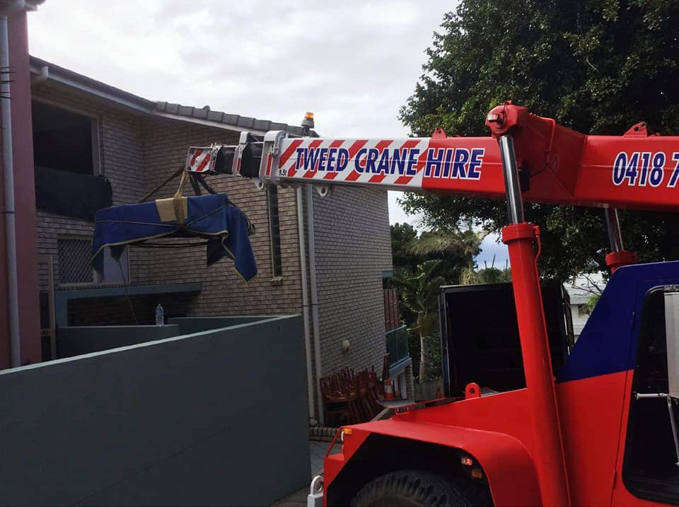 Red Crane Lift | Maryborough, QLD | Adam Charles Removals