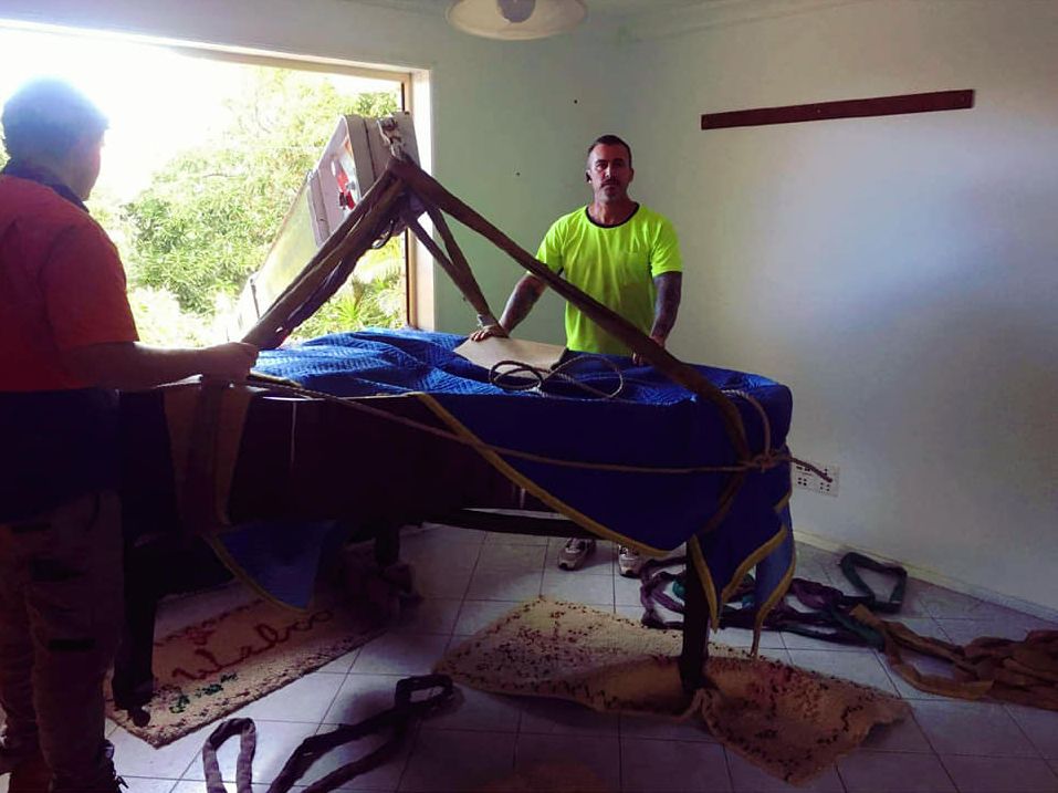 Man with Piano | Maryborough, QLD | Adam Charles Removals