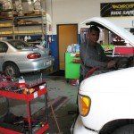Auto Technician Servicing Truck - Auto Repair and Services in La Puente, CA