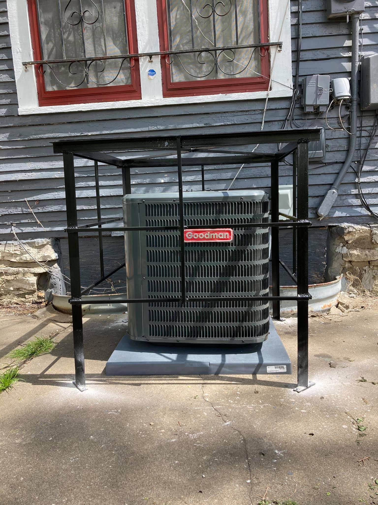 Goodman AC condenser unit installed outside a residential home