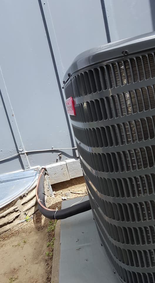 Goodman air conditioning unit installed with insulated refrigerant line
