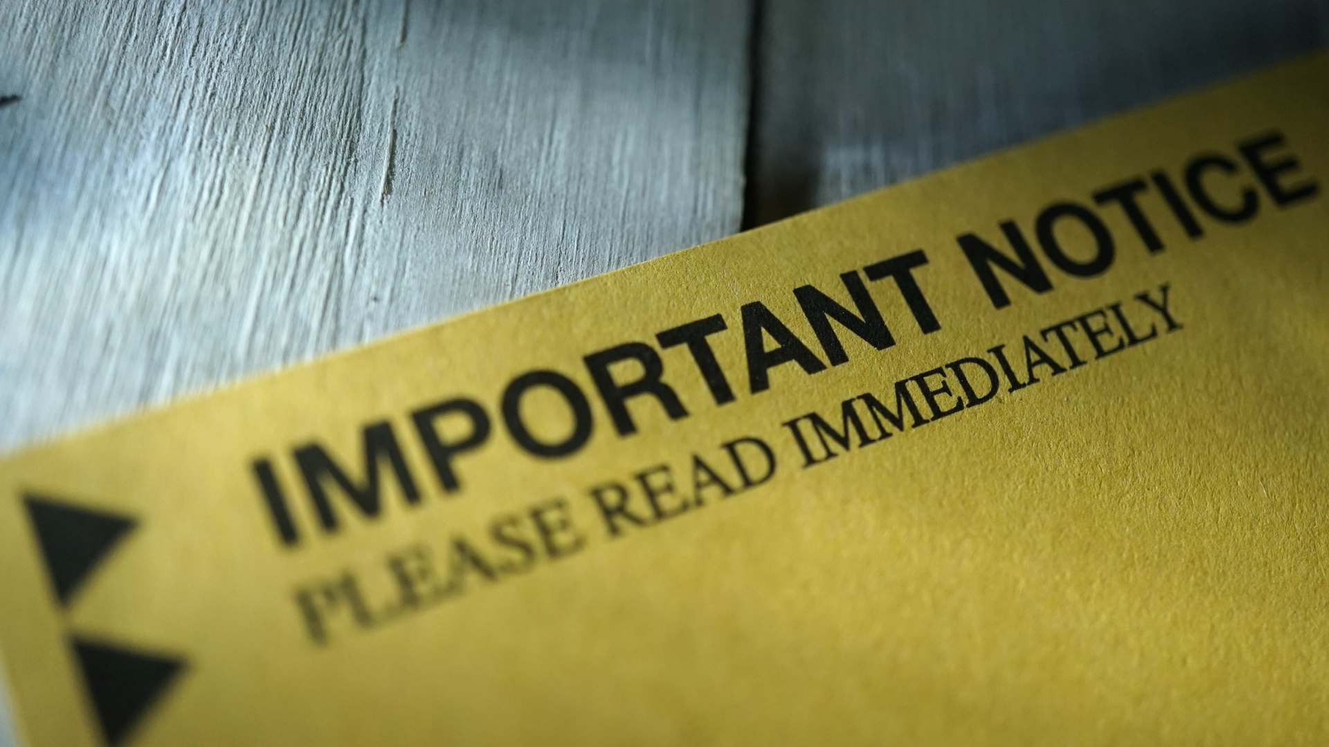 Yellow paper with “IMPORTANT NOTICE” in black; “PLEASE READ IMMEDIATELY” below.