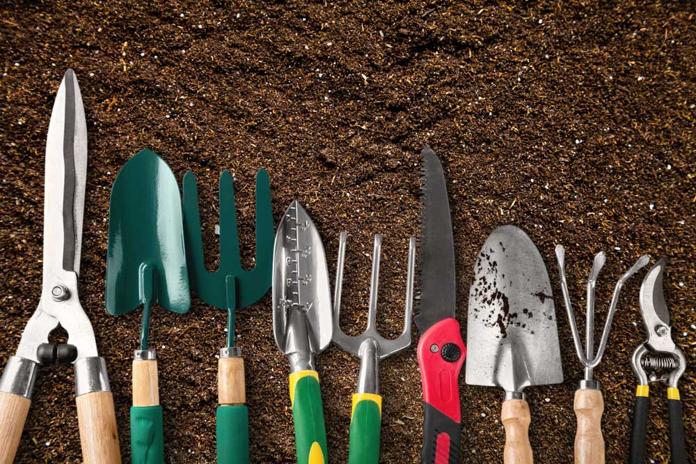 Garden Tools On The Ground Land — Premium Gardening Supplies in Gympie, QLD