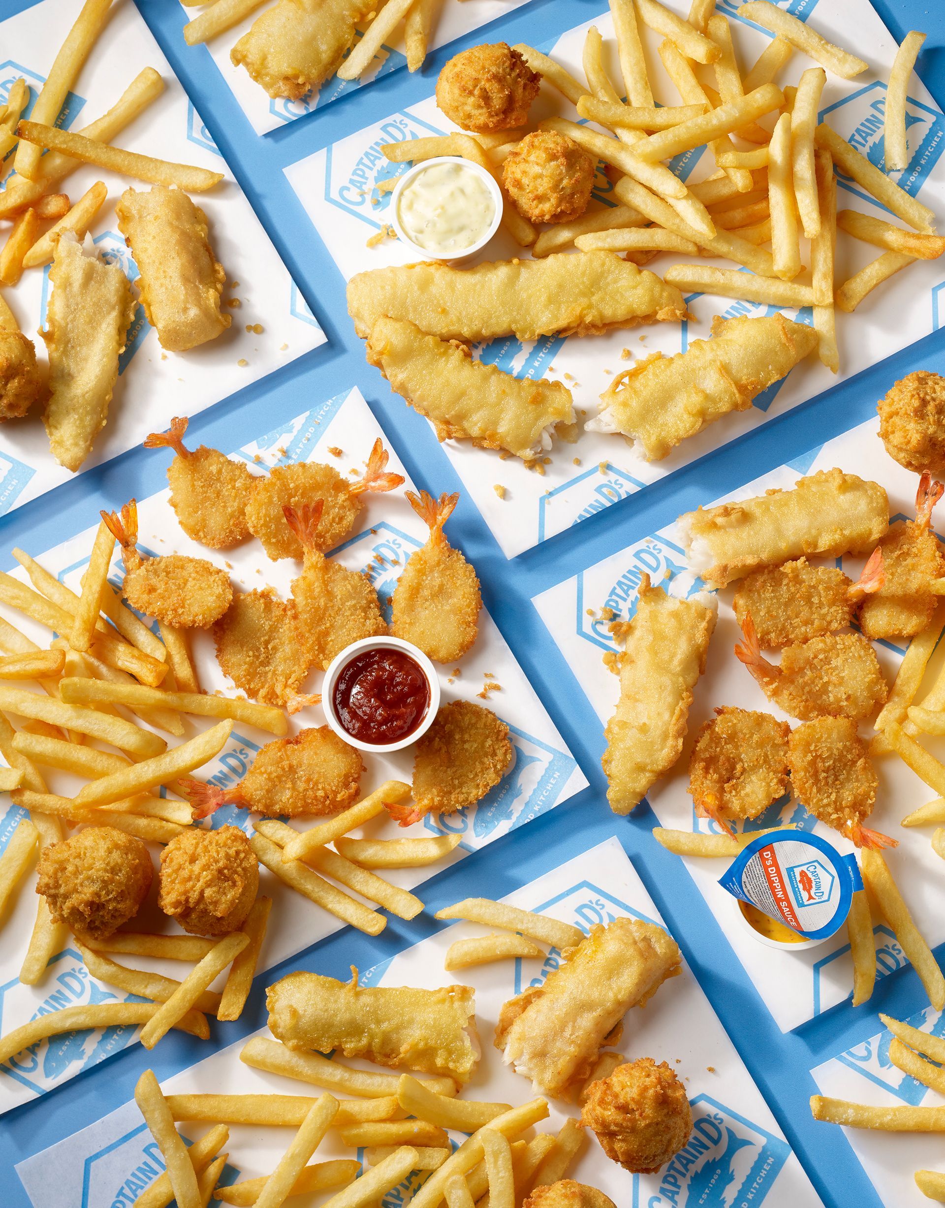 Food photographer Rusty Hill captures the crispy goodness of a seafood spread for Captain D's.