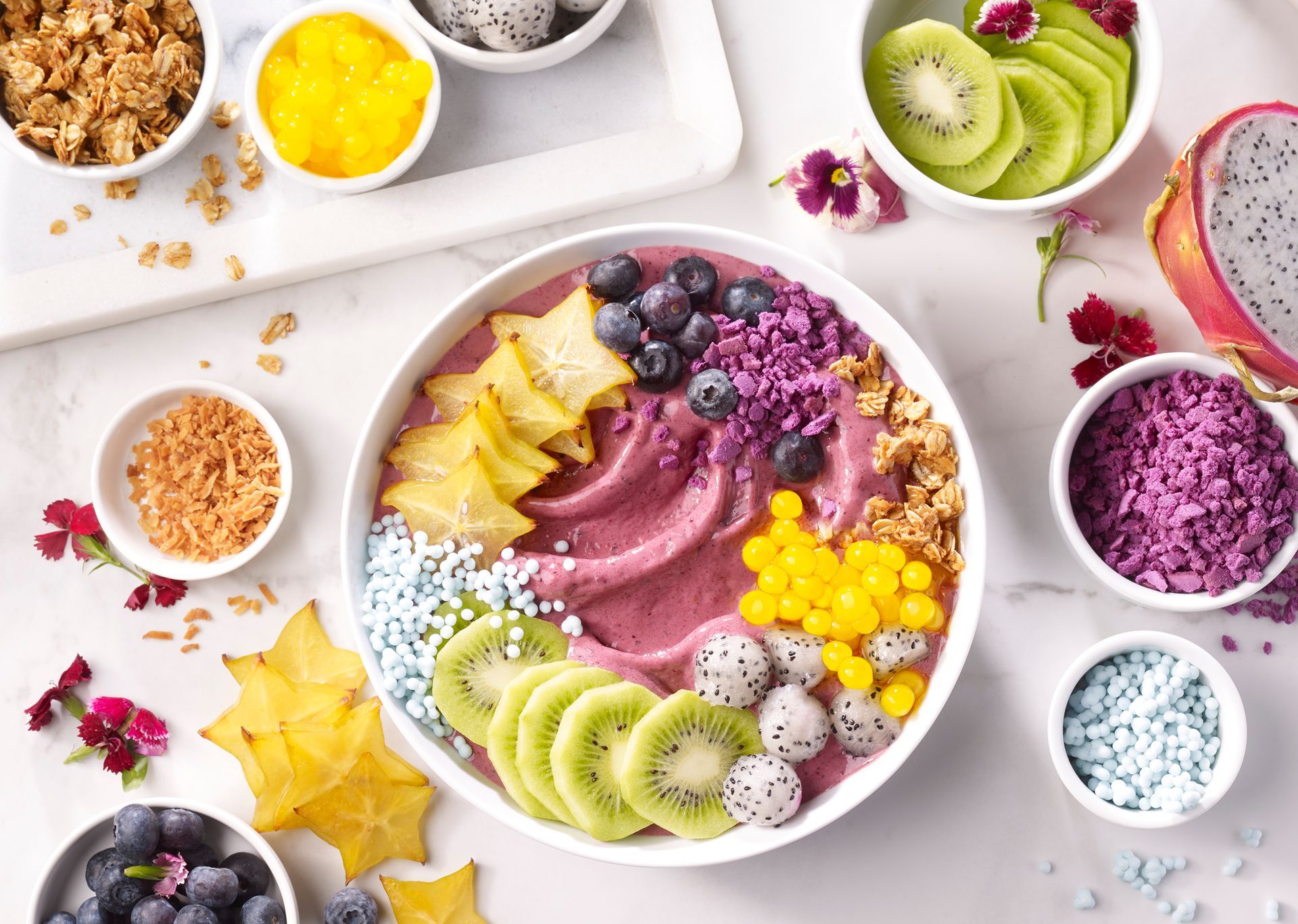 rusty hill photography images of an acai bowl with toppings and fresh ingredients around it