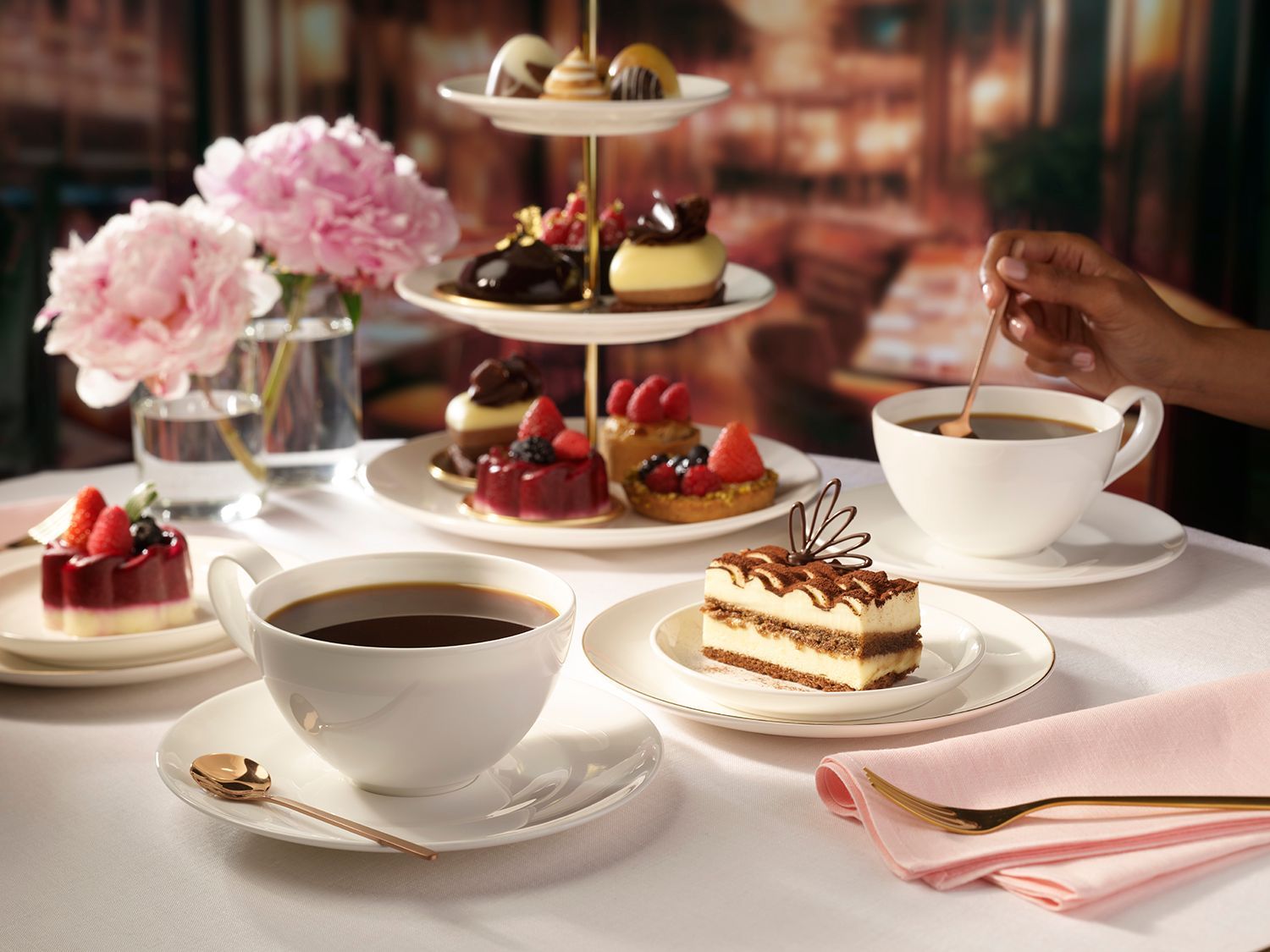 Rusty Hill’s coffee photography blends tea party elegance, café craft, and home comfort seamlessly.