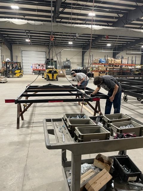 employees assembling trailers
