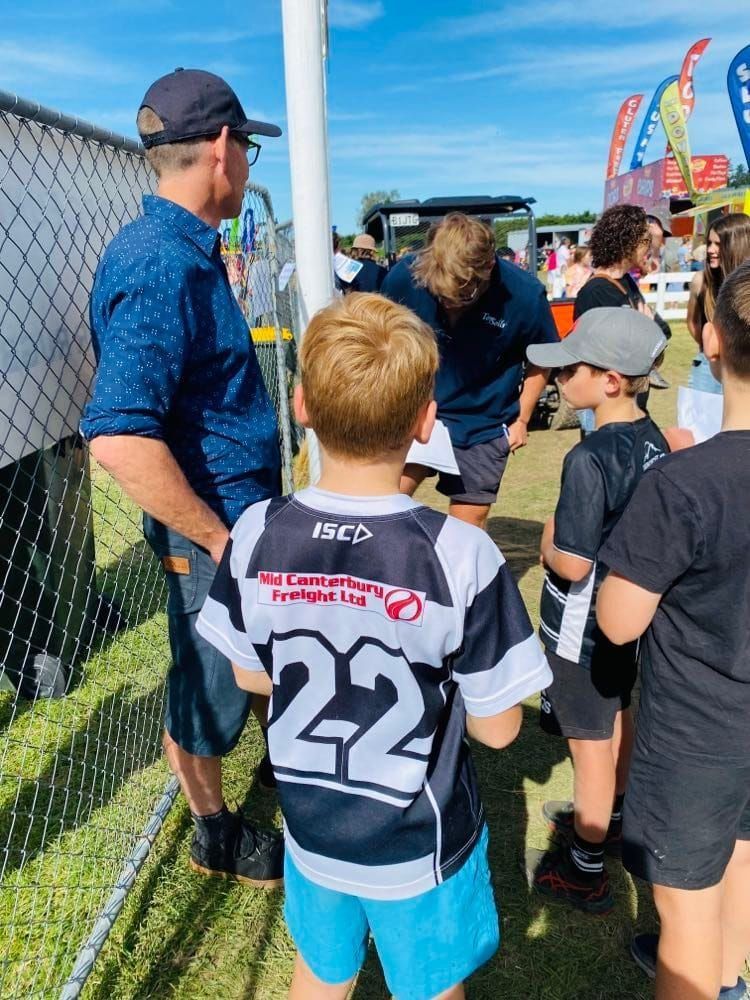 A boy wearing a jersey with the number 22 on it
