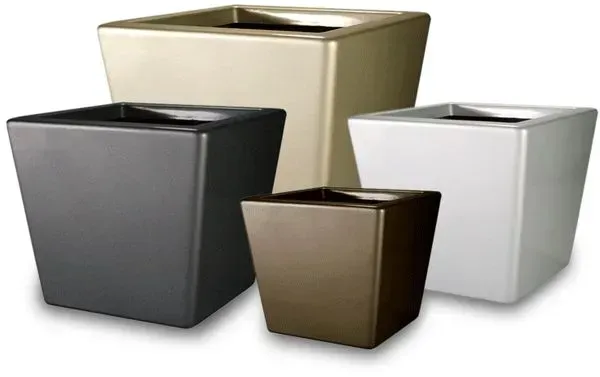 Four square, tapered planters in shades of beige, gray, white, and brown.