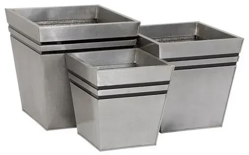 Three square silver metal planters of different sizes.
