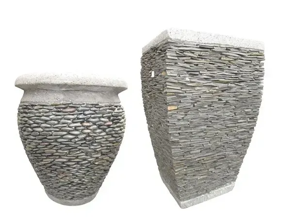 Two stone planters: one round with pebble texture, the other trapezoidal with stacked slate.