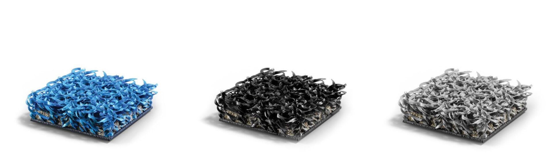 Tre blocchi quadrati, porosi e testurizzati, nei colori blu, nero e grigio.