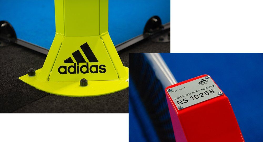 Immagini ravvicinate dei blocchi di partenza del marchio adidas con base gialla e supporto rosso. Include il logo adidas.