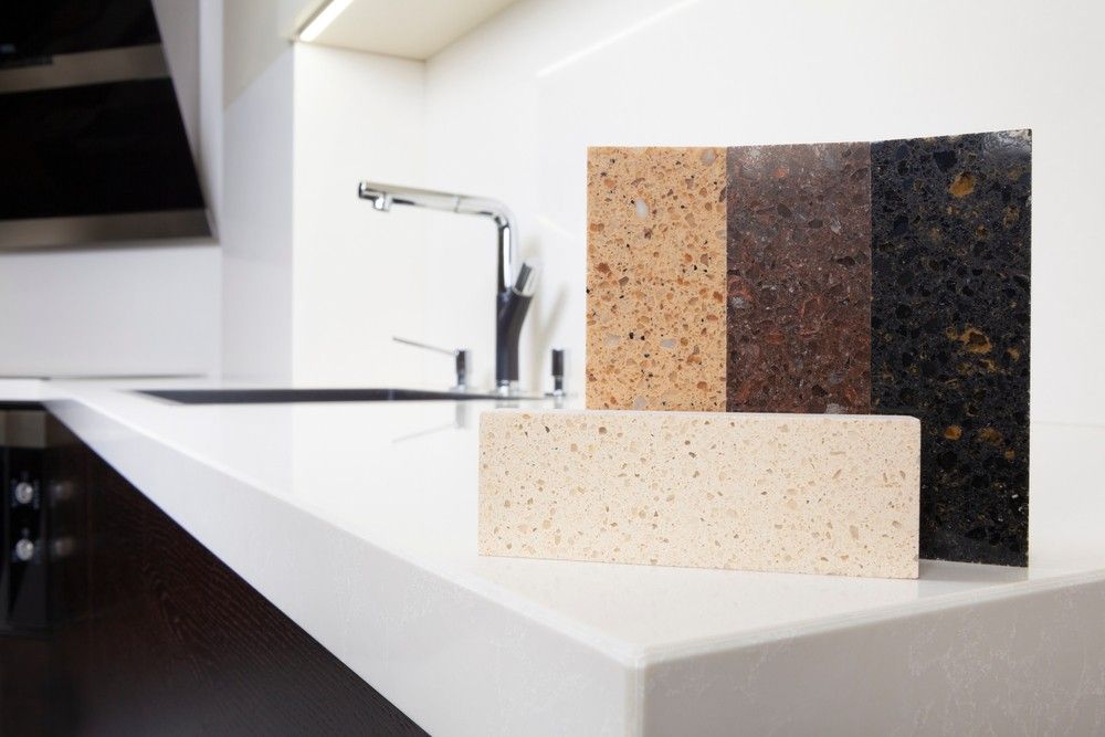 A Kitchen Counter With Three Different Types of Counter Tops — Elite Stone in Gold Coast, QLD
