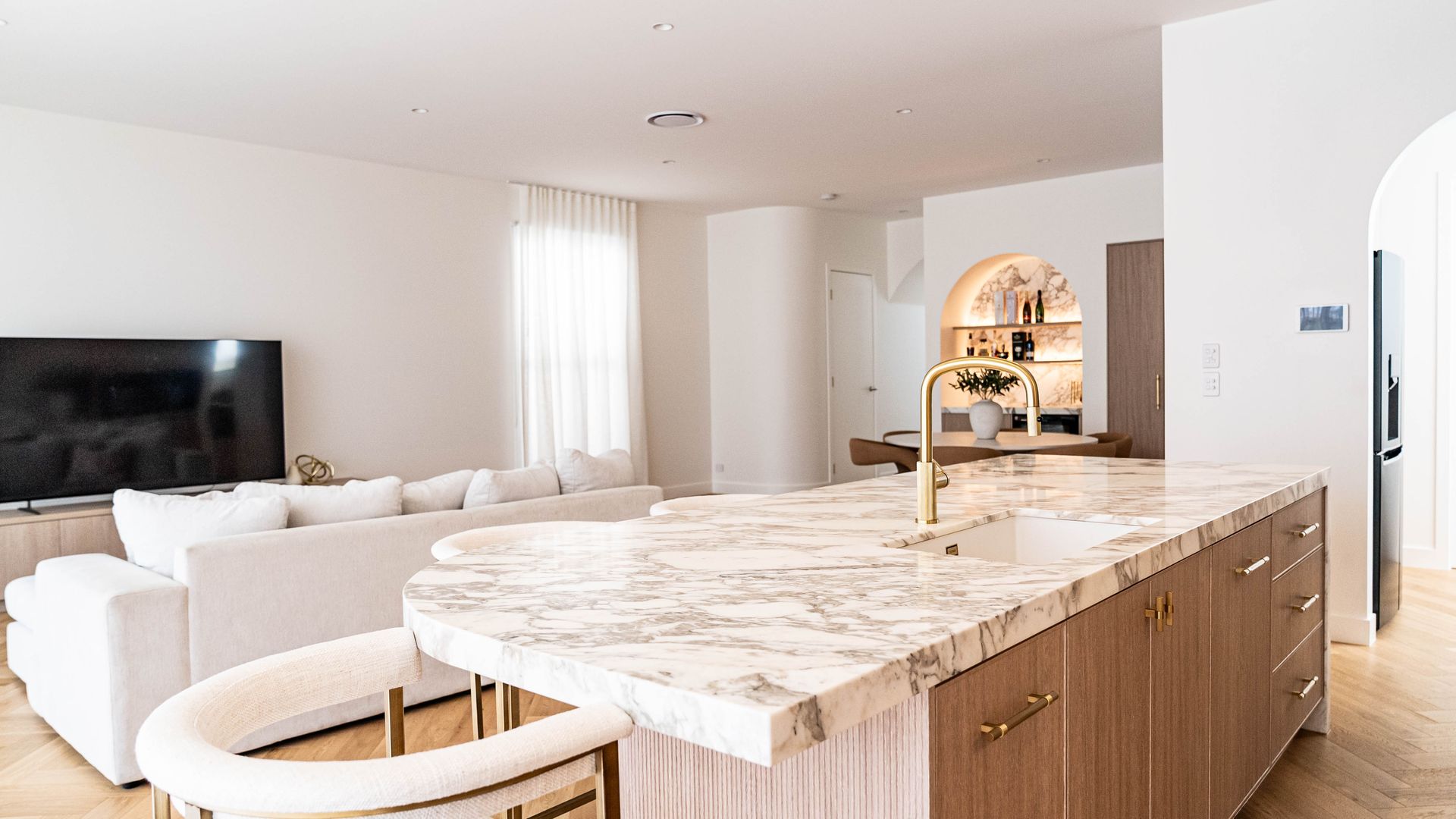 A Bright, Open-plan Kitchen and Living Room Featuring a Marble-topped Island — Elite Stone in Tweed Heads South, NSW