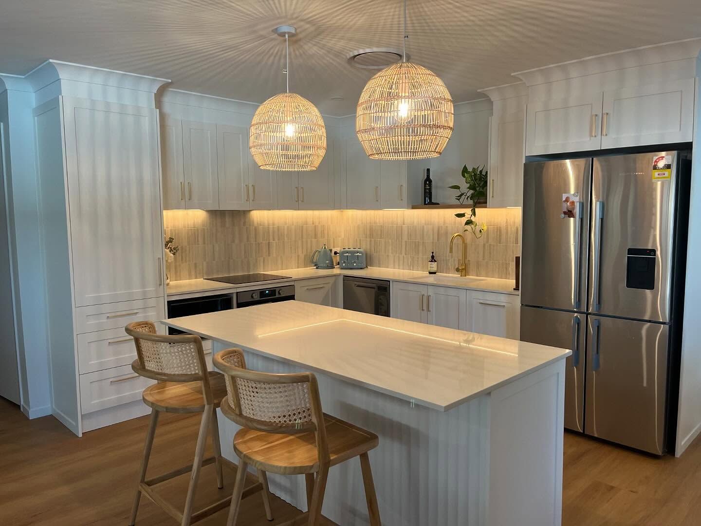 Bright White Modern Kitchen With Marble Island