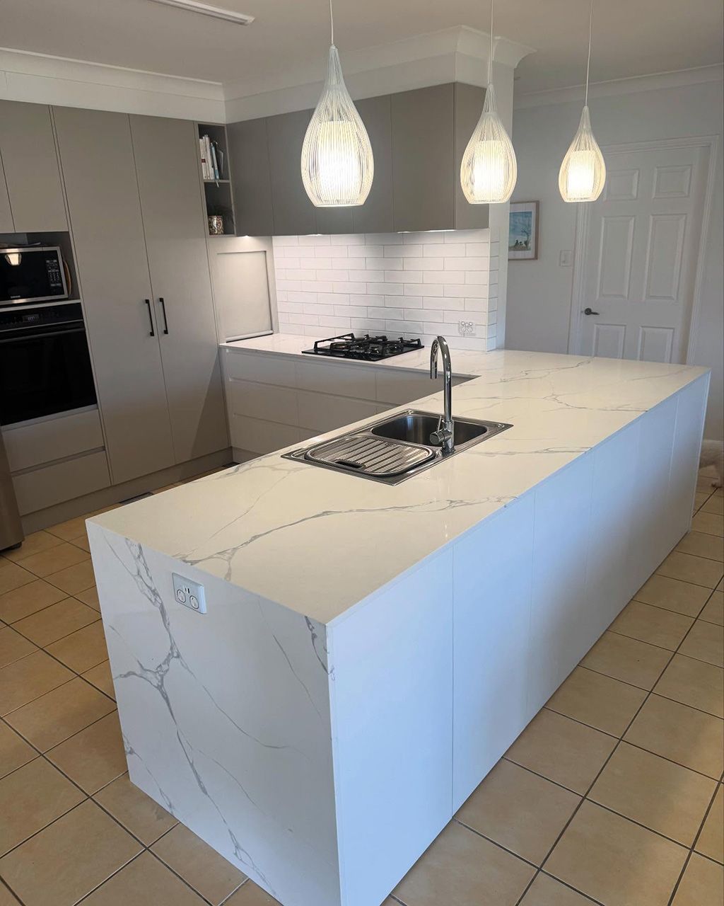 Modern White Kitchen With Stone Benchtop