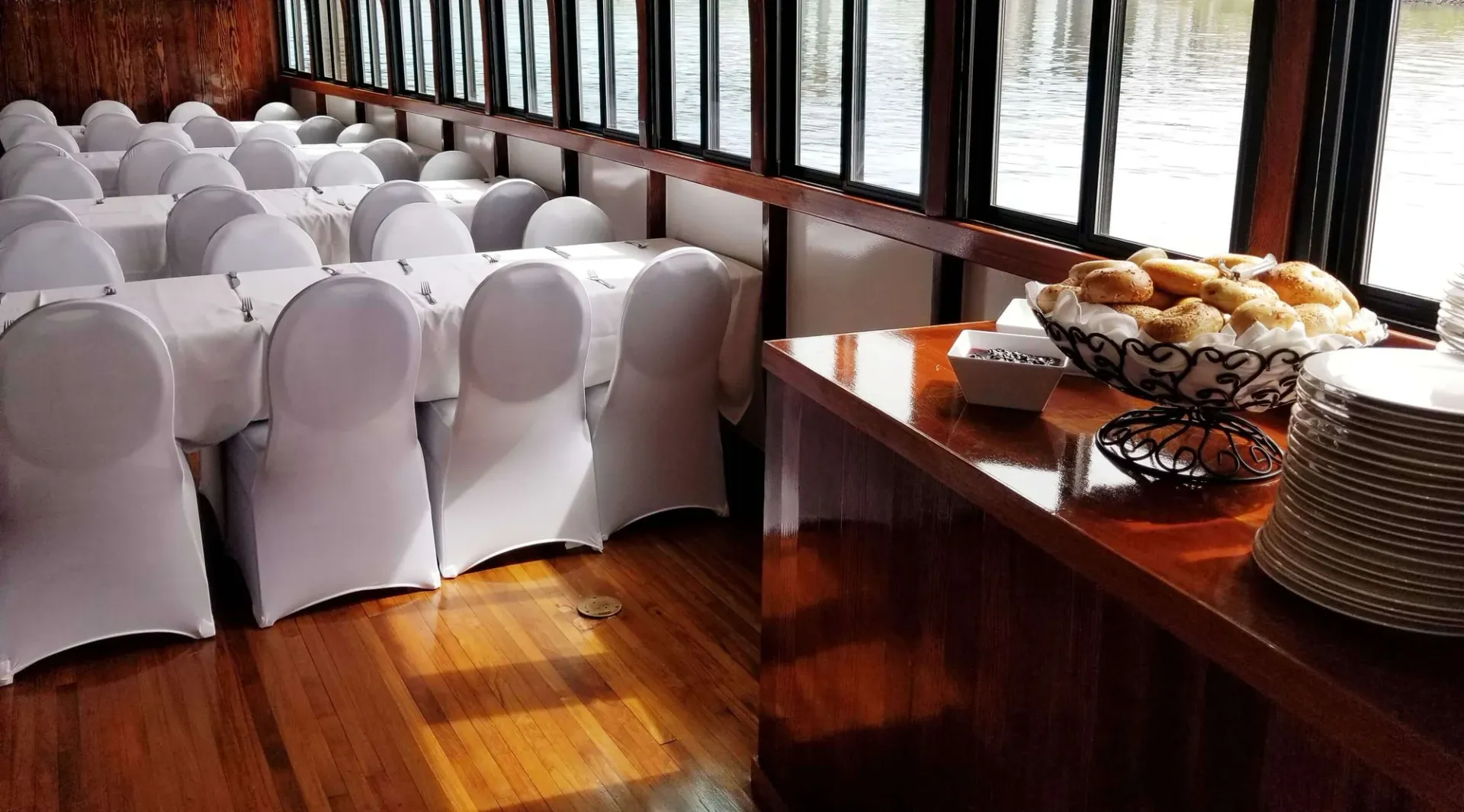 Lowest deck with dining chairs and tables — Albany, NY — Dutch Apple Cruises
