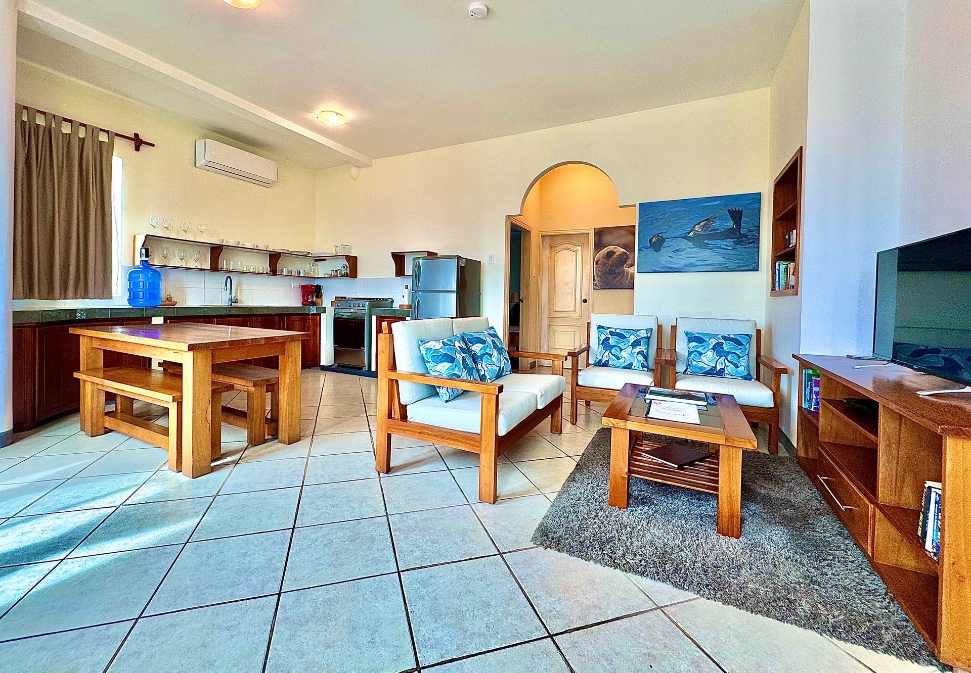 Bright living space with kitchen and dining area