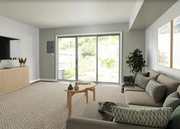 Living room with oversized sliding glass door to private patio 