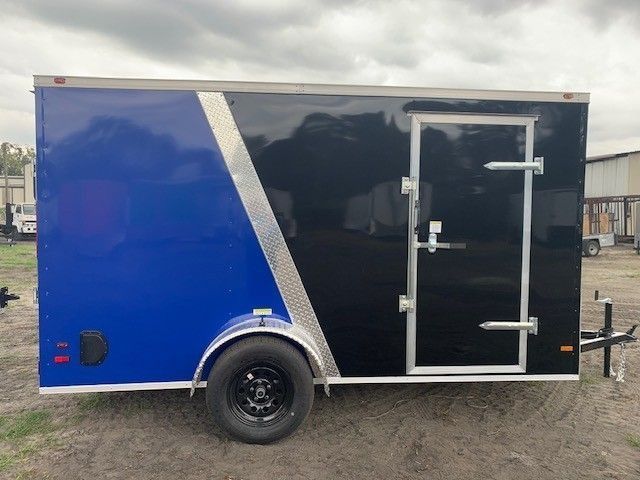 Blue and black enclosed cargo trailer with a diagonal silver stripe and black door.
