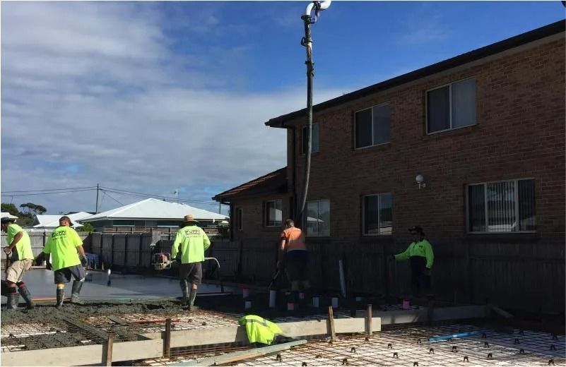 Construction Workers Pouring Concrete — Easy Mix Concrete in Berkeley Vale, NSW