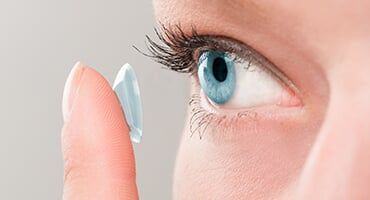 Woman Wearing Contact Lens—Eye Doctor in Edina, MN