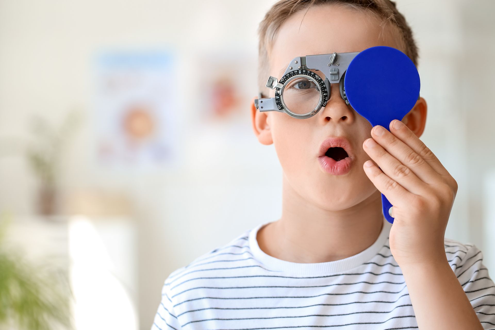 Pediatric eye exam in a clinical setting using standard vision screening tools. Pediatric eye exam in a clinical setting using standard vision screening tools.