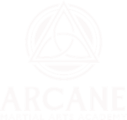 White logo for Arcane Martial Arts Academy, featuring a triangular knot emblem above the academy's name in block letters.